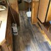 Broken fresh water tank caused major water damage in this horse trailer. After a new tank new wood floors and molding this is the beautiful outcome. 